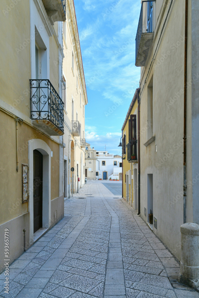 Obraz premium A narrow street in Termoli, a seaside town in the province of Campobasso in Italy.