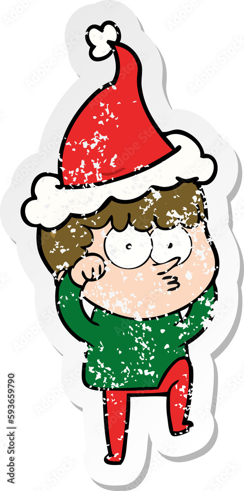 distressed sticker cartoon of a curious boy rubbing eyes in disbelief wearing santa hat distressed sticker cartoon of a curious boy rubbing eyes in disbelief wearing santa hat