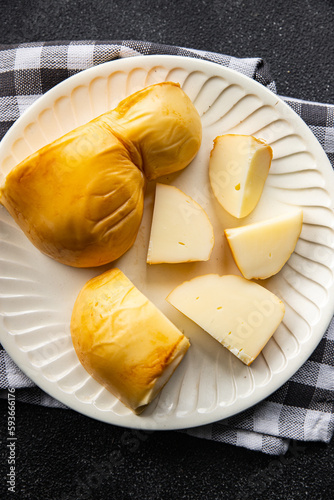 cheese scamorza smoked flavor fresh food snack on the table copy space food background rustic top view photo