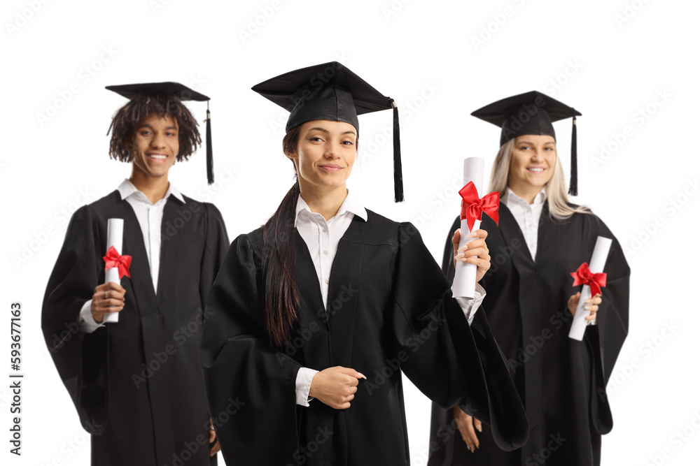 Group of happy graduate students in gowns holding diplomas Group of happy graduate students in gowns holding diplomas