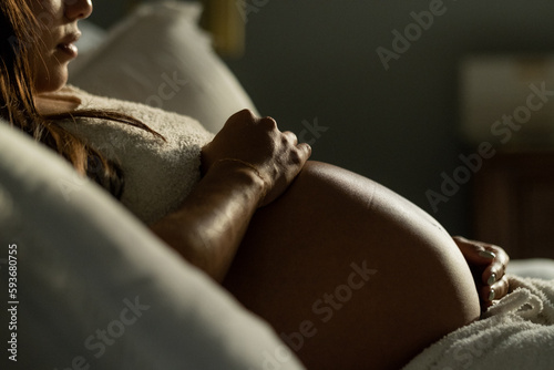 Pregnant Woman resting in bed