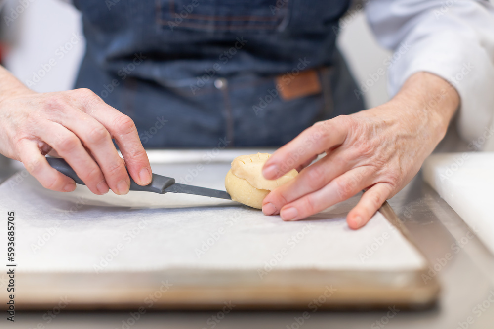Obraz premium Pastry chef making sweets, rugelach and croasant