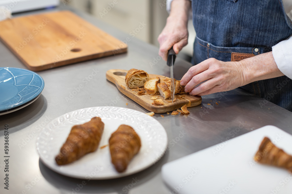Pastry chef making sweets, rugelach and croasant Pastry chef making sweets, rugelach and croasant