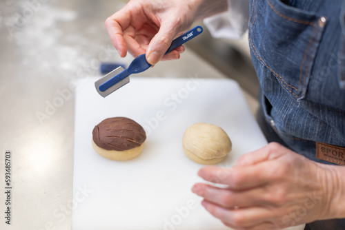 Pastry chef making sweets, rugelach and croasant photo