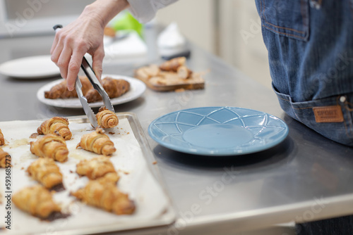 Pastry chef making sweets, rugelach and croasant