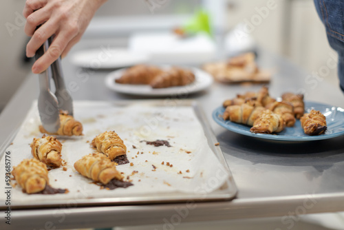 Pastry chef making sweets, rugelach and croasant
