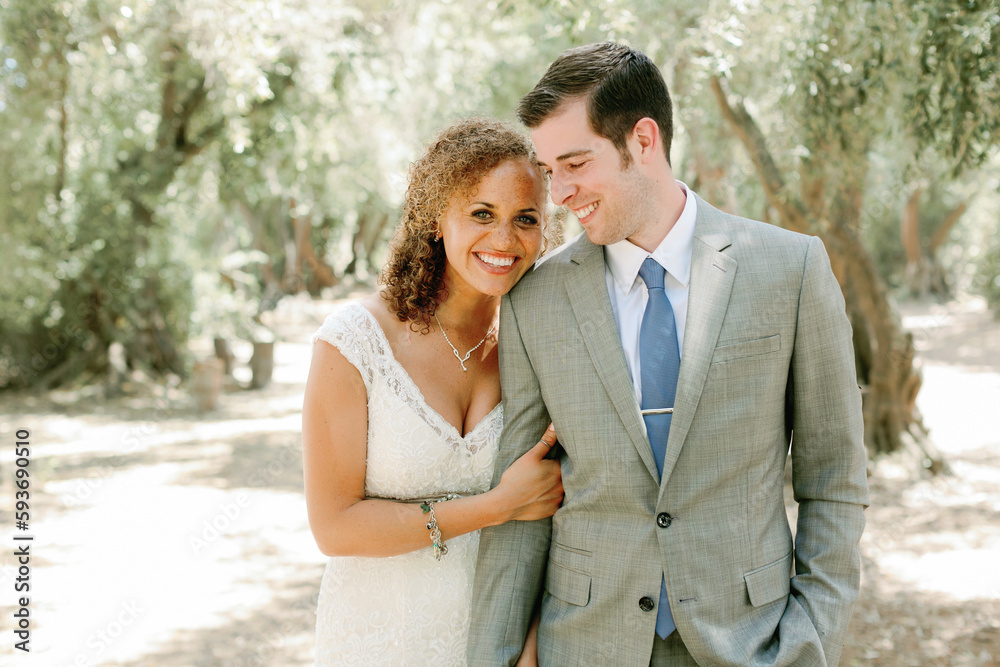 Wedding Couple Between Olive Trees Wedding Couple Between Olive Trees