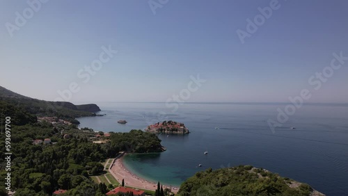 Aerial video of Sveti Stefan Montenegro Old city beach. Beautiful place, old island, Montenegro  tourism.