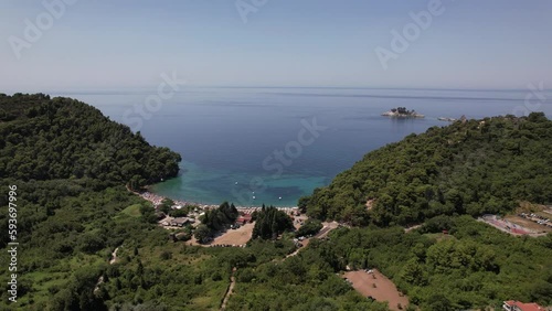 Aerial video of Sveti Stefan Montenegro Old city beach. Beautiful place, old island, Montenegro  tourism.