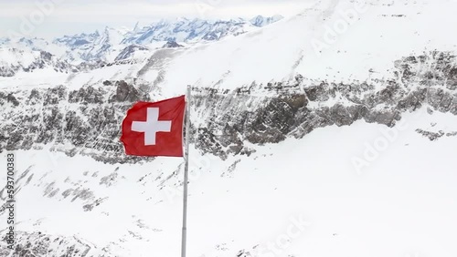 Wallpaper Mural Swiss flag over a peak walk in the alps aerial view by drone Torontodigital.ca