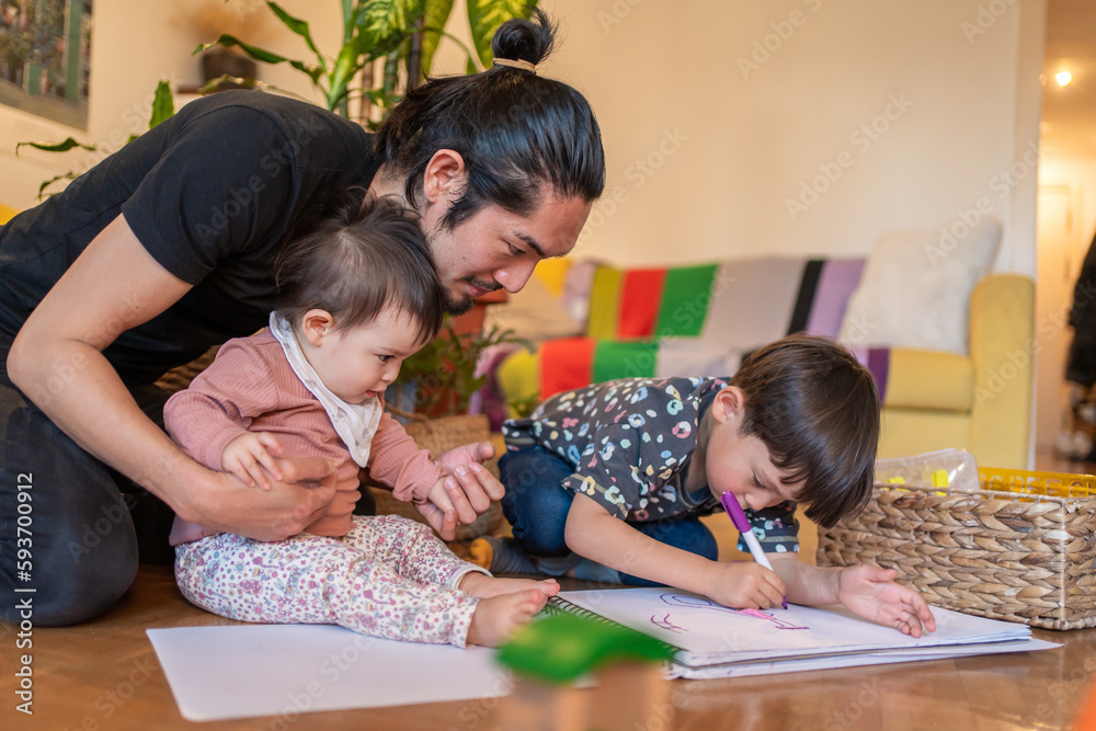 Asian Man Enjoys Fatherhood With Her Two Toddlers Asian Man Enjoys Fatherhood With Her Two Toddlers