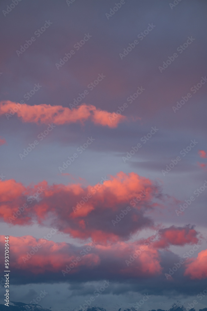 Stunning view of snowcapped mountains during a beautiful sunset.