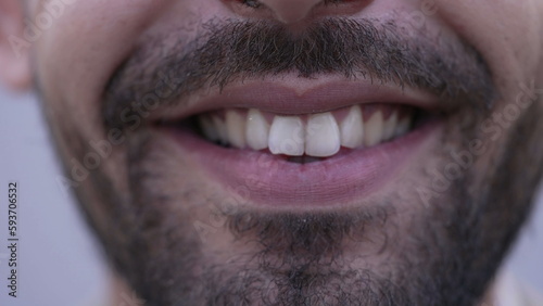 One happy Middle Eastern man mouth closeup smile. Bearded male person macro detail smiling