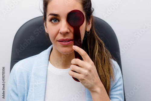 Patient using an optical oclusor photo