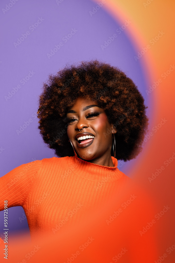 Smiling black woman with afro hair Smiling black woman with afro hair
