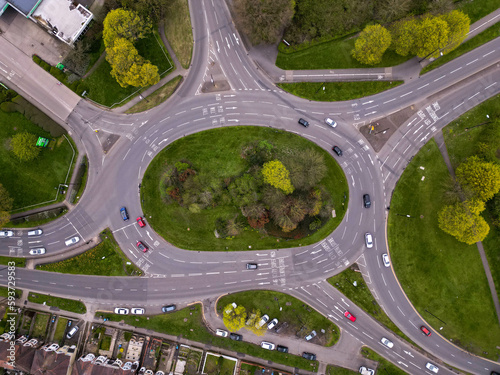 Roundabout from a drone view busy with cars