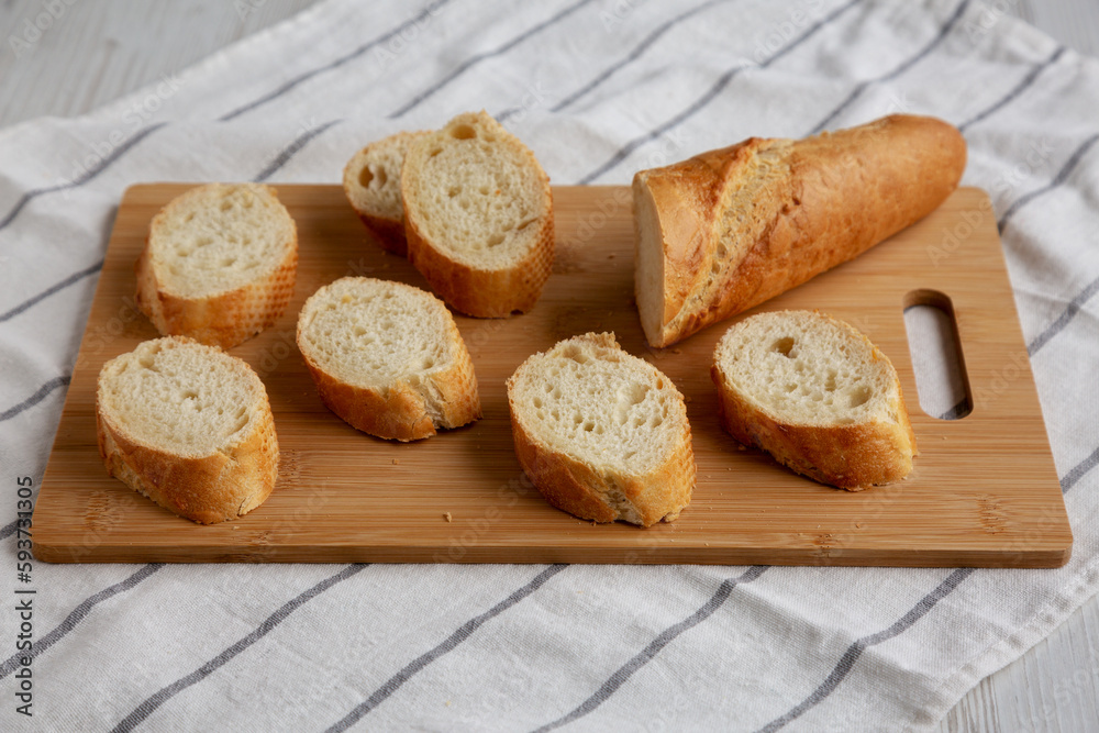 Homemade Sliced Bread on a bamboo board, low angle view. Homemade Sliced Bread on a bamboo board, low angle view.