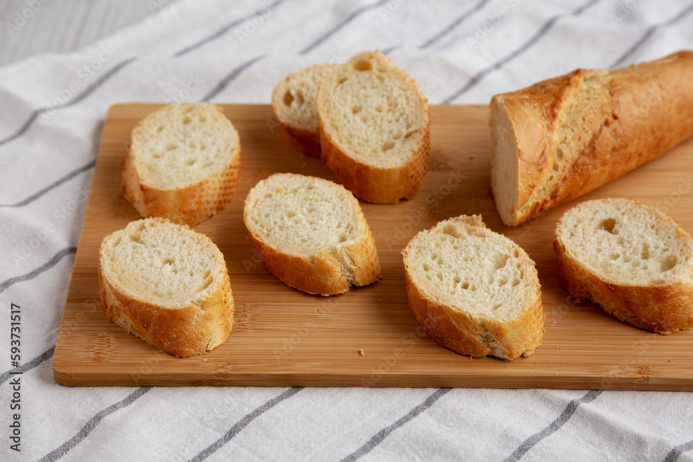 Homemade Sliced Bread on a bamboo board, low angle view. Homemade Sliced Bread on a bamboo board, low angle view.