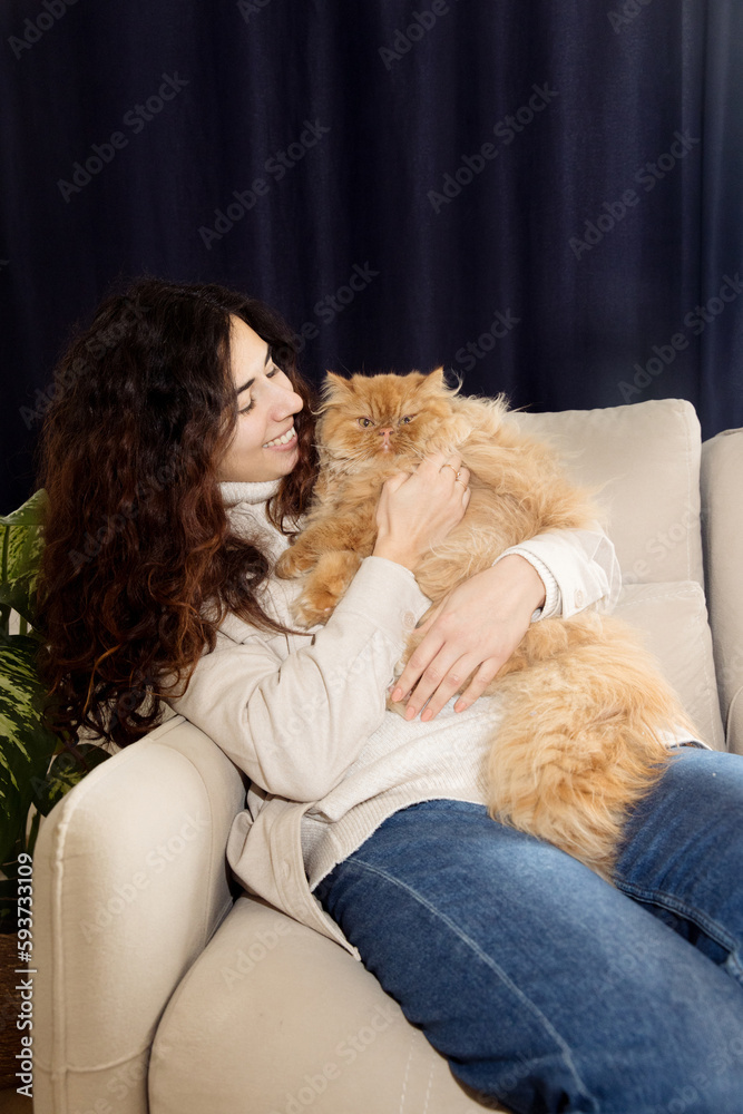 a woman with a red cat a woman with a red cat