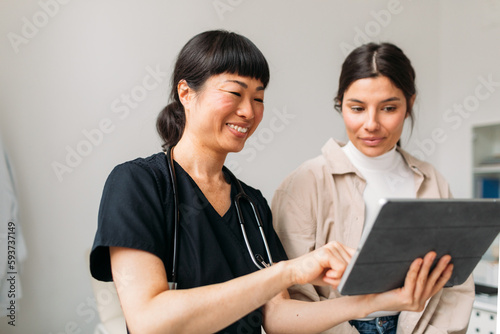 Young Woman on Checkup at Her Doctor   photo