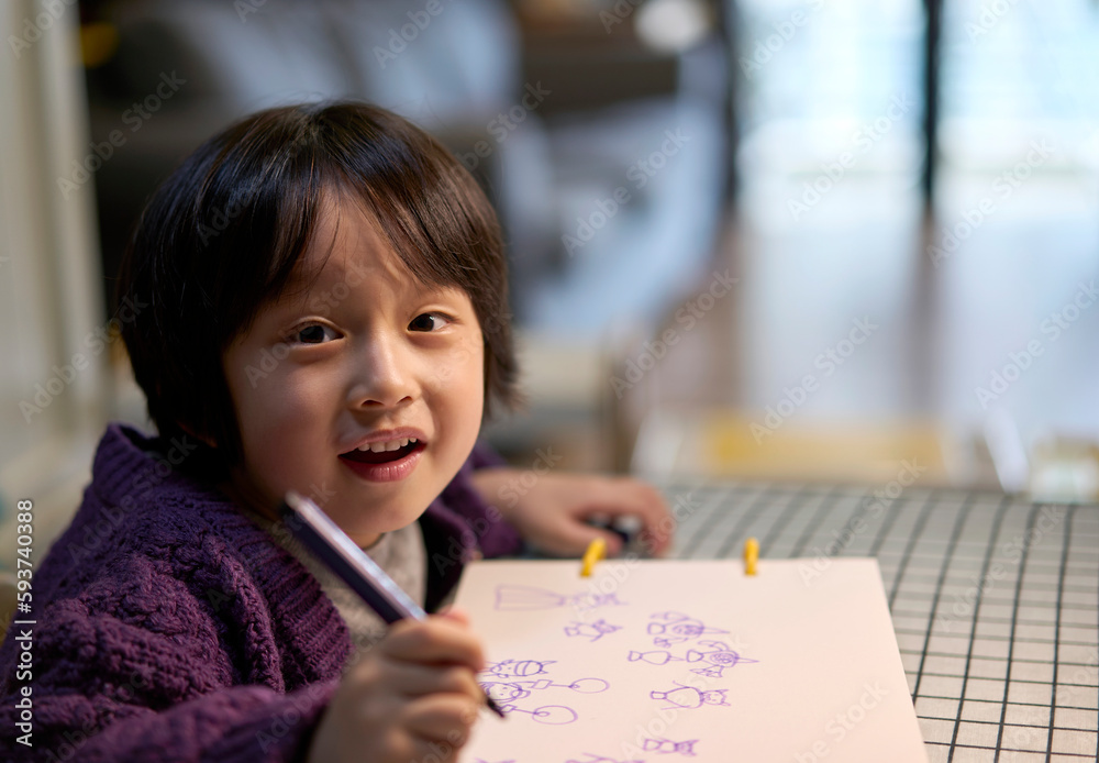 Asian little boy drawing at home Asian little boy drawing at home