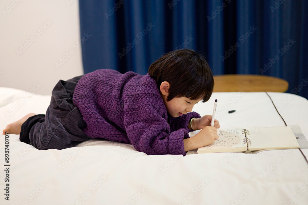 Asian little boy drawing at home Asian little boy drawing at home