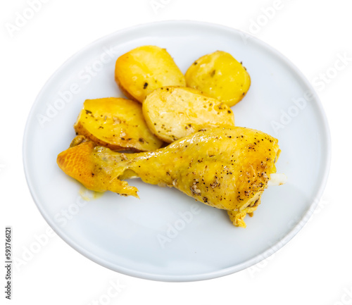 Fototapeta Naklejka Na Ścianę i Meble -  Beautifully served dish of grilled chicken thigh with fried potatoes. Isolated over white background