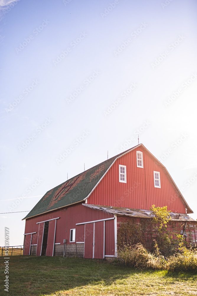 Red barn on sun sunshine sunny farm farmland Red barn on sun sunshine sunny farm farmland