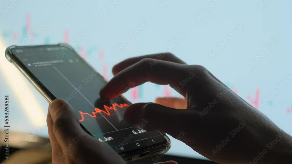 Broker or investor monitors the dynamics of the stock price or cryptocurrency