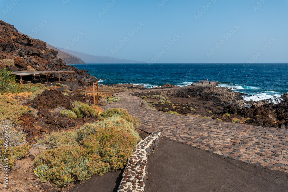 Path to reach the recreational area for barbecues in the Orchilla Pier on the southwest coast of El Hierro. Canary Islands