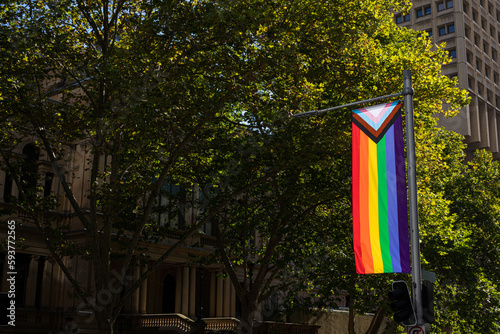 LGBT community flag hanging from a pole with copyspace photo