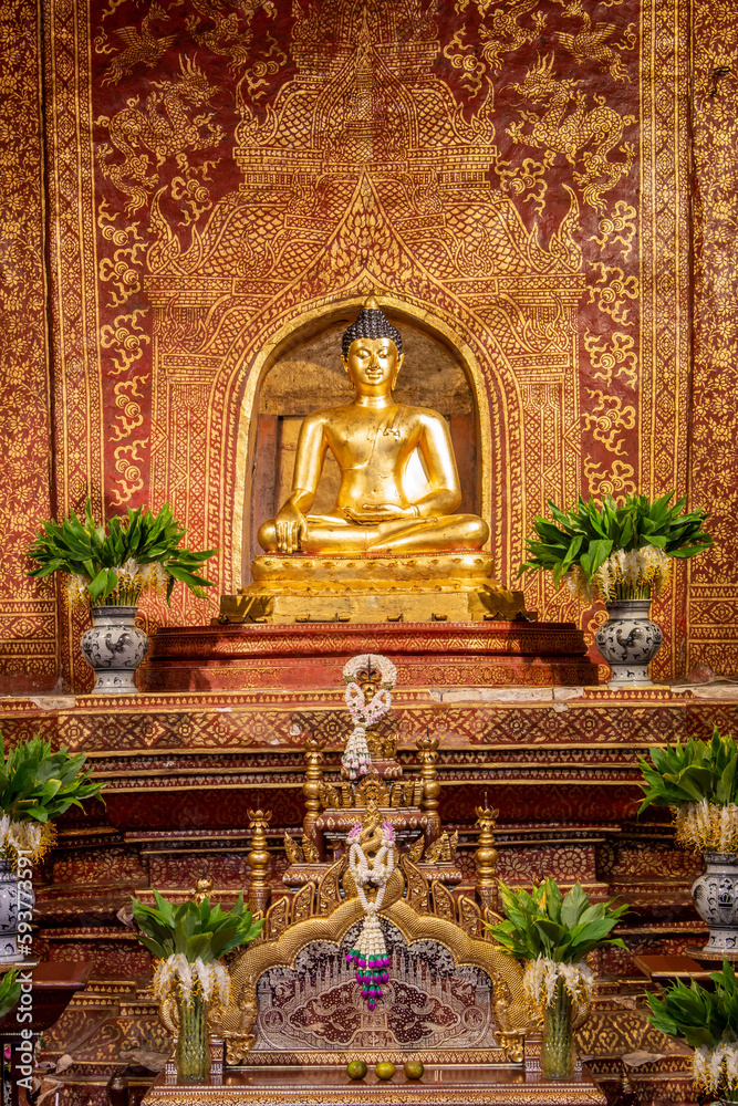 The Phra Buddha Sihing statue in the Viharn Lai Kham at Wat Phra Singh , Chiang Mai , Thailand