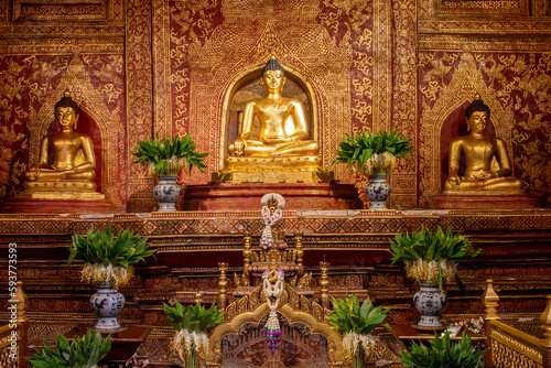 Obraz na płótnie The Phra Buddha Sihing statue in the Viharn Lai Kham at Wat Phra Singh , Chiang Mai , Thailand w salonie