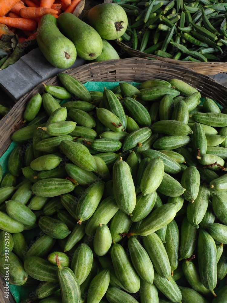 Tropical fresh organic vegetables are piled in a shop for selling Tropical fresh organic vegetables are piled in a shop for selling