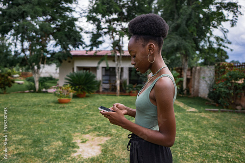 Black teenager in green top