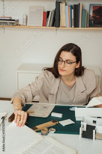 Female Architect Working in Studio photo