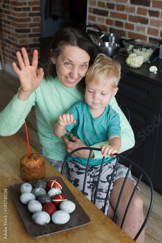 Woman ,boy and easter eggs