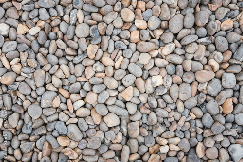 Grey and brown coloured pebbles photo