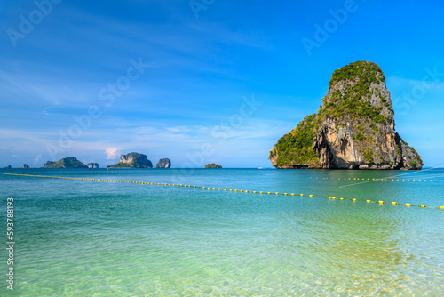 Huge cliff rock in azure water, Ko Rang Nok, Ao Phra Nang Beach, Ao Nang, Krabi, Thailand © Eagle2308
