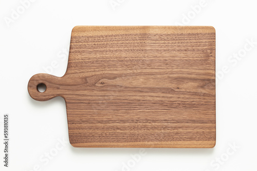 Handmade walnut wood cutting board on white background. wooden cutting board