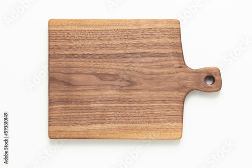 Cutting board isolated on white. Handmade walnut wood cutting board on white background.