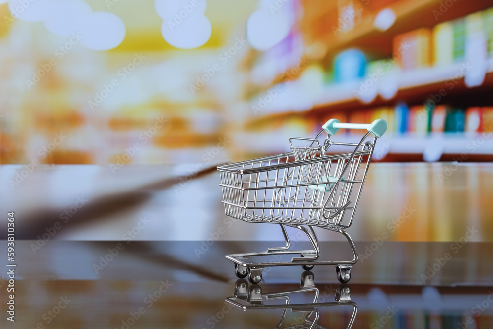 Supermarket cart with out of focus background, retail concept Supermarket cart with out of focus background, retail concept