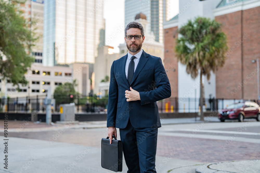 serious business man employer outdoor. business man employer in the street. serious business man employer outdoor. business man employer in the street.