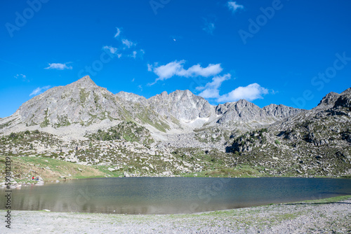 Las Abelletas lake in the city of Pas de la Casa, Encamp in Andorra in summer.