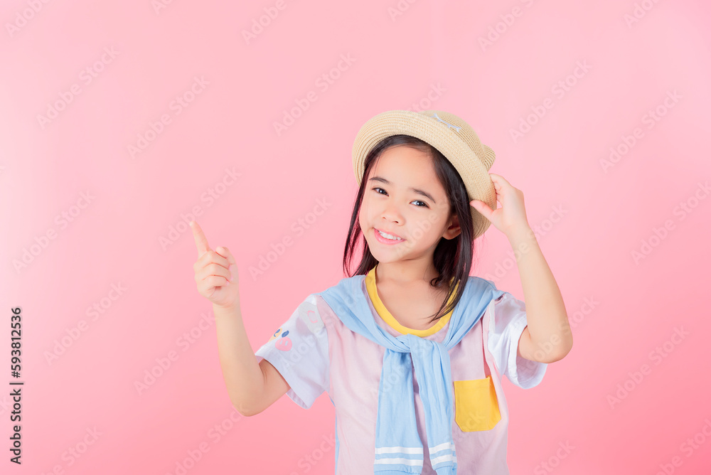 Image of Asian child posing on Pink background Image of Asian child posing on Pink background