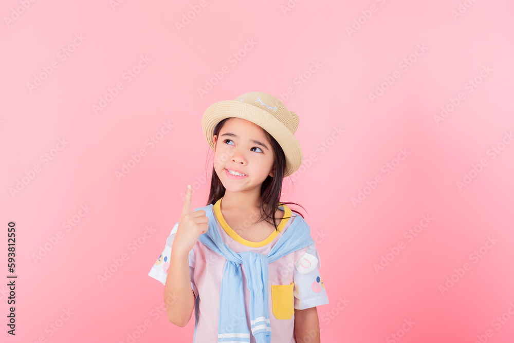 Image of Asian child posing on Pink background Image of Asian child posing on Pink background