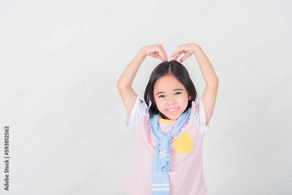 Image of Asian child posing on white background Image of Asian child posing on white background