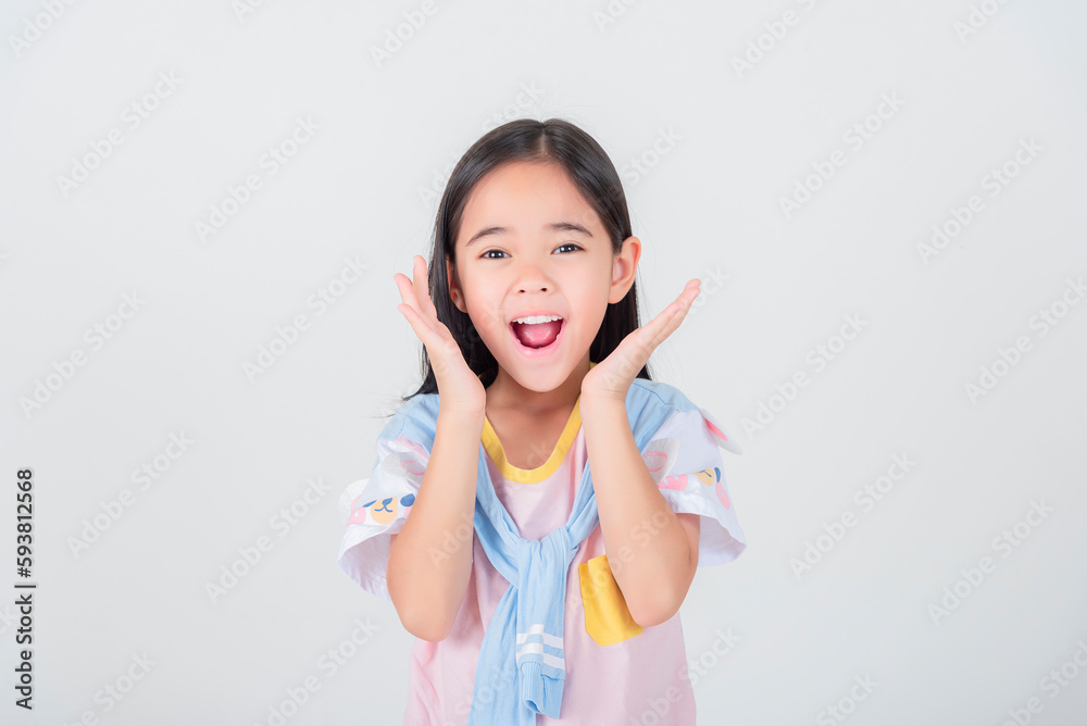 Image of Asian child posing on white background Image of Asian child posing on white background