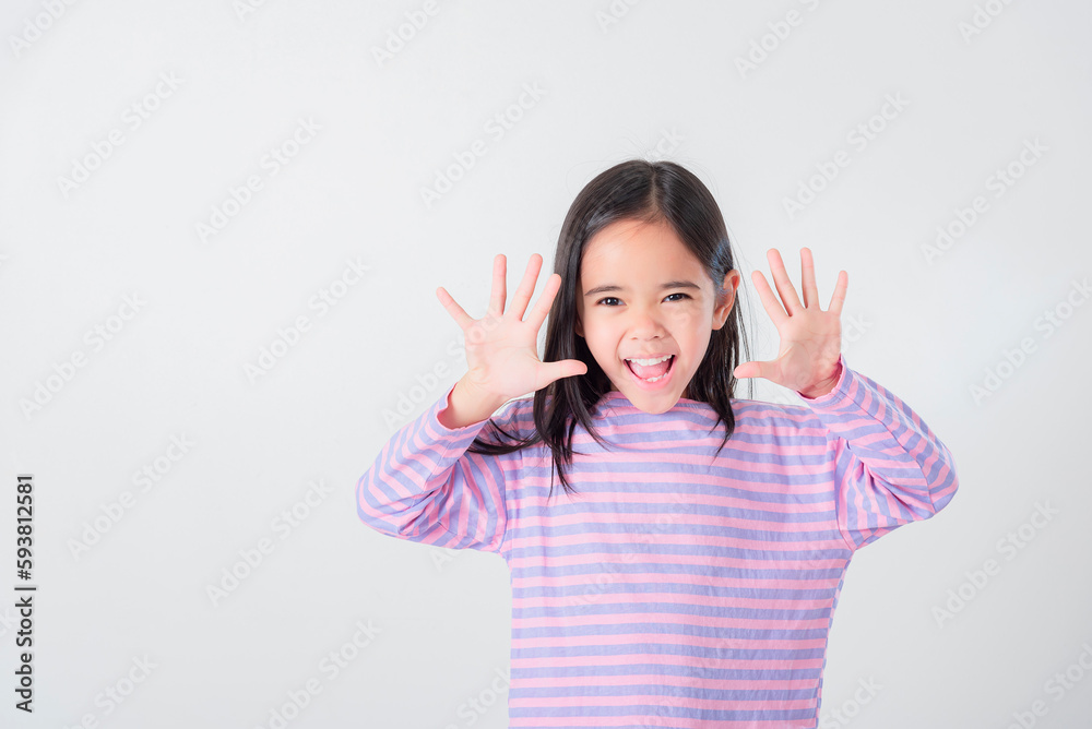 Image of Asian child posing on white  background