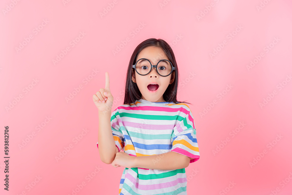 Image of Asian child posing on Pink background Image of Asian child posing on Pink background